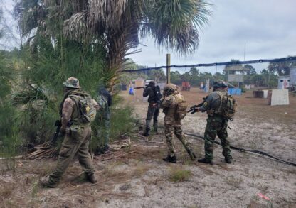 Airsoft Players Flanking Airsoft Players flanking the other team at Palm Bay Paintball Park