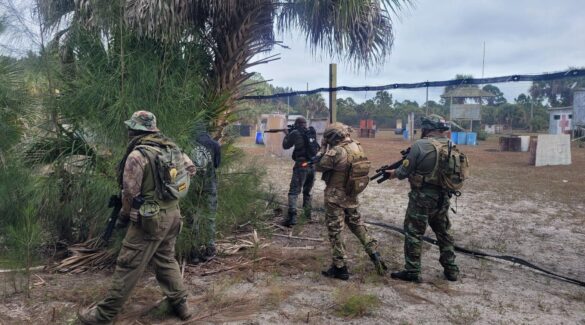 Airsoft Players flanking the other team at Palm Bay Paintball Park