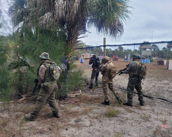 Airsoft Players flanking the other team at Palm Bay Paintball Park
