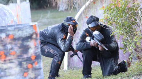 Rental Players at Palm Bat Paintball Park working together