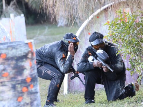Rental Players at Palm Bat Paintball Park working together